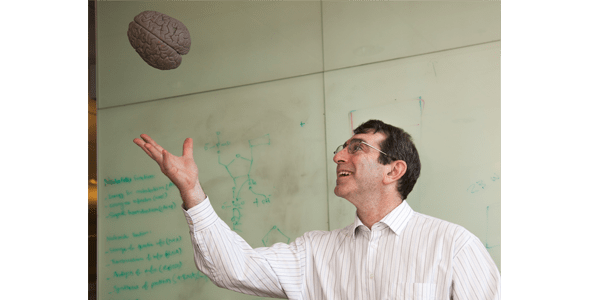 Research Associate Professor Eric Chudler juggles a rubber brain