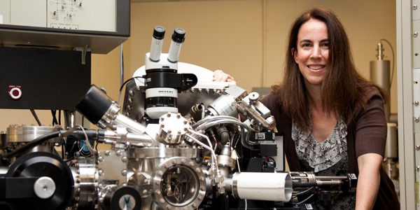 Lara Gamble, research associate professor of bioengineering, with lab equipment