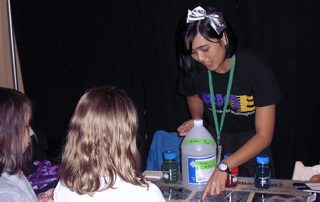 UW Bioengineering student working with young children