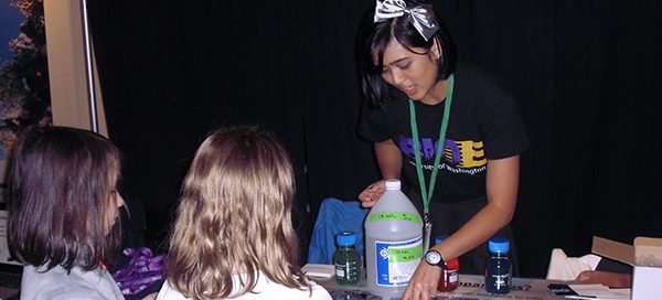 UW Bioengineering student working with young children