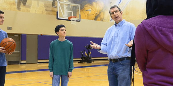 Eric Chudler and BrainWorks co-stars playing basketball