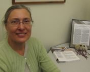 Dr. Wendy Thomas sitting in her office.