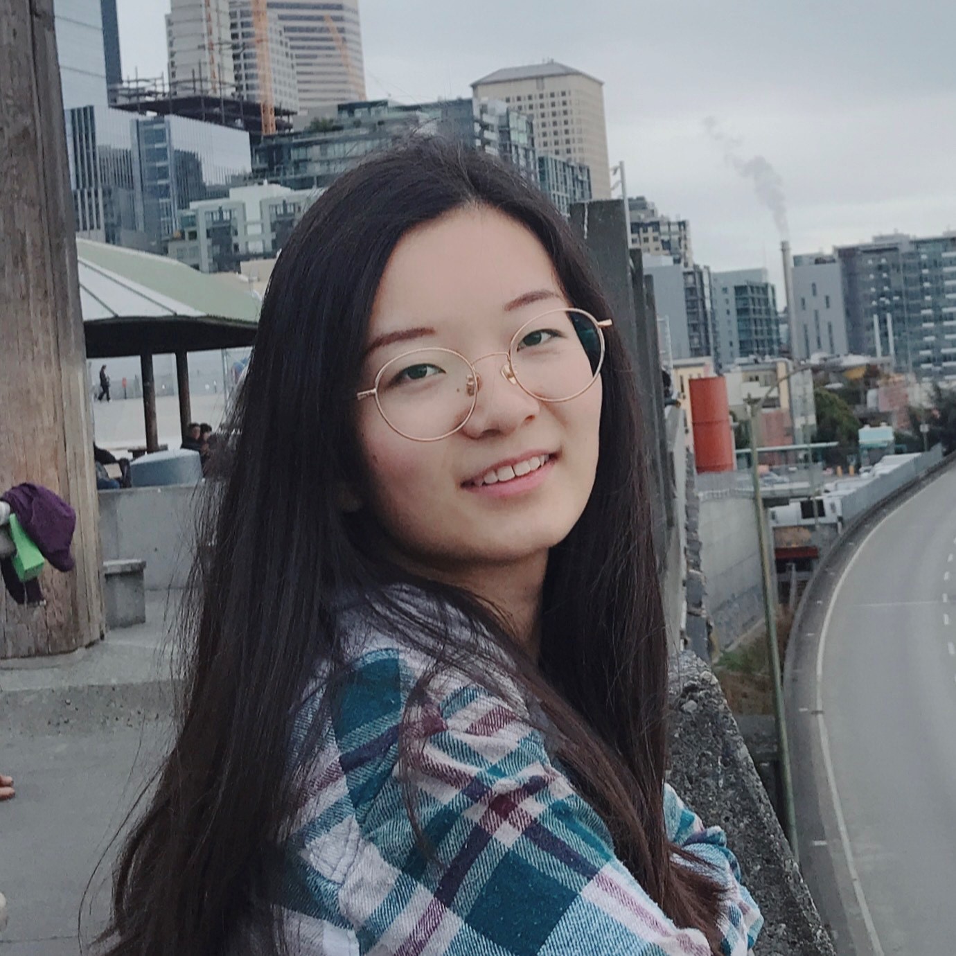 medium shot of Laura Lyu with city background