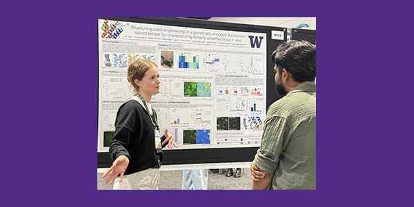 Lily Torp explaining a research poster