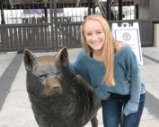 Marissa Shumaker with Dubs statue