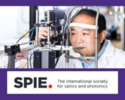 Ruikang Wang, a Professor of Bioengineering and Ophthalmology at the University of Washington, using a piece of lab equipment