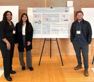 The members of team VenoSense (Kirandip Walia, Cynthia Sainz and Justus Brown) standing in front of their poster at the 2025 Science & Technology Showcase